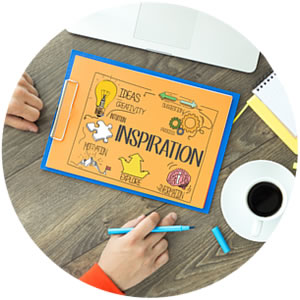 Photo of clip board and the word inspiration.